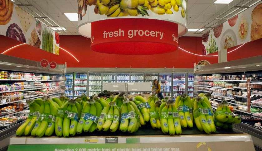 Bananas are displayed for sale as a customer shops at a Target Corp. store in Seattle, Washington, U.S., on Thursday, May 14, 2015. Target Corp. is scheduled to release earnings figures on May 20. Photographer: David Ryder/Bloomberg via Getty Images
